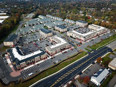 Aerial view of a senior living complex with multiple buildings