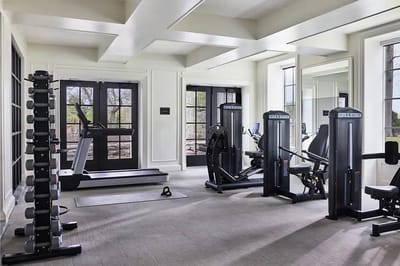 Well-equipped fitness room with exercise machines