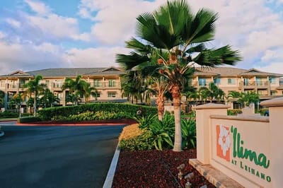 Exterior view of Kisco Ilima at Leihano with palm trees