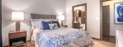 A well-furnished private bedroom in the facility