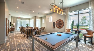 Interior view of a billiards room with seating