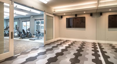 Interior view of a fitness area with exercise equipment