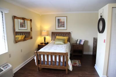 Cozy, well-lit resident room at the facility