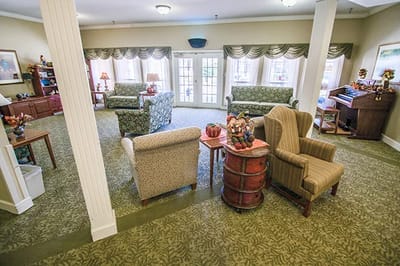 Bright common area with seating and decor