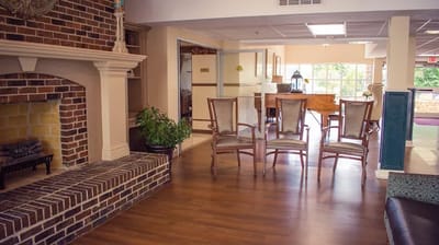 Cozy common area with seating and a fireplace