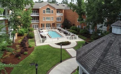 Outdoor view of a landscaped area with a swimming pool