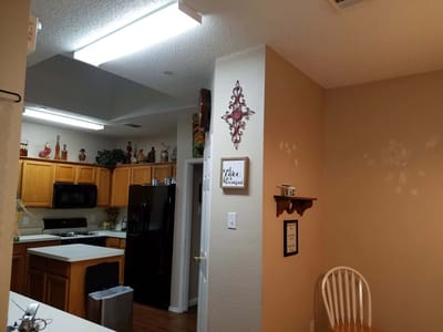 Interior kitchen space with appliances and decor