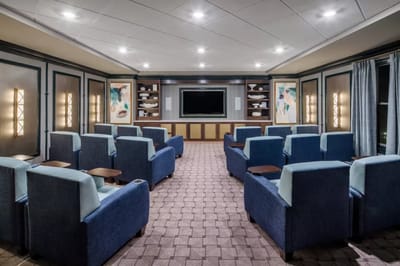 Bright common area with seating for residents