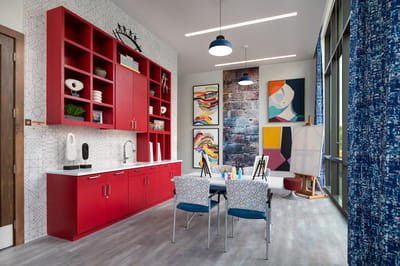 Bright activity room with colorful art and furniture