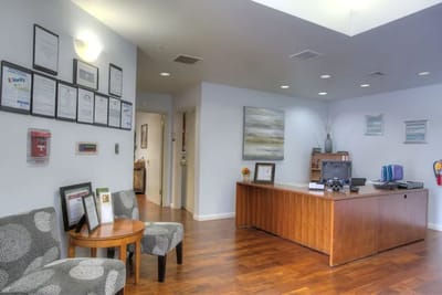 Bright interior lobby with reception desk and seating