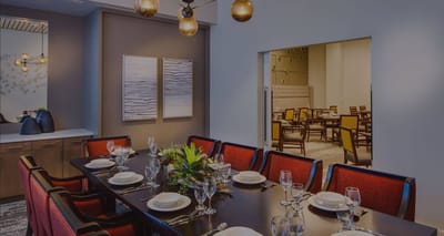 Elegant dining room setup with a long table and decor