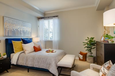 Cozy, well-decorated resident room with food setup