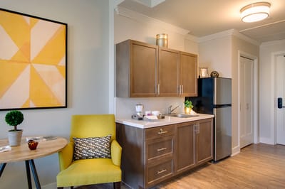 Bright kitchen area in a resident suite
