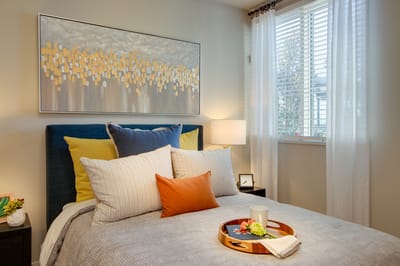 Cozy private resident room with decorated bed