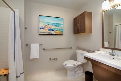 Brightly lit restroom with modern amenities
