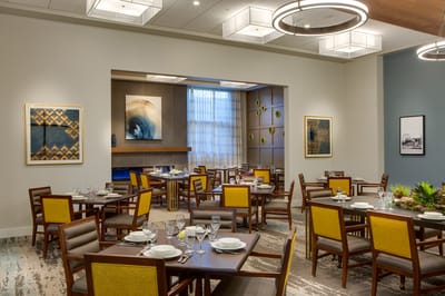 Elegant dining room with tables set for service