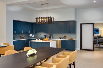 Bright kitchen area with dining table and modern finishes