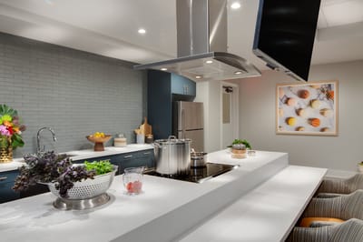 Modern kitchen space with cooking pots and fresh ingredients