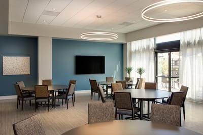 Bright common area with seating and natural light
