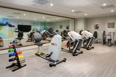 Well-equipped fitness center with exercise machines