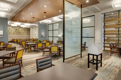 Brightly lit dining room with modern decor