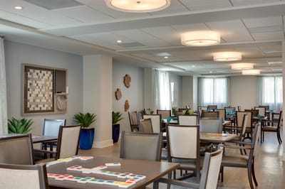 Bright dining area with tables set for activity