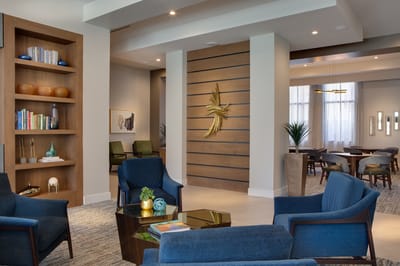 Bright common area with seating and decor