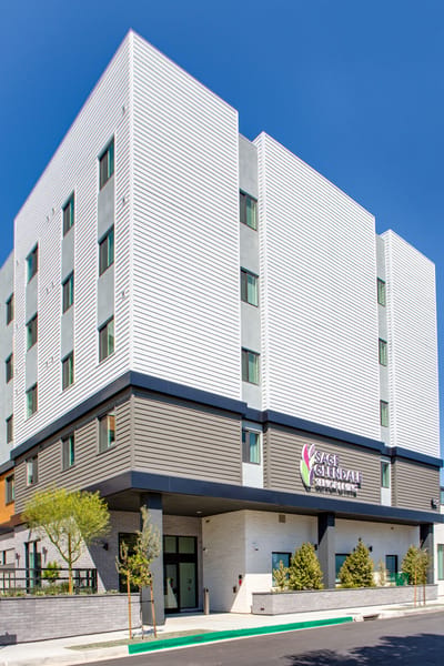 Exterior view of Sage Glendale facility with logo