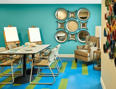 Activity room with art supplies and seating