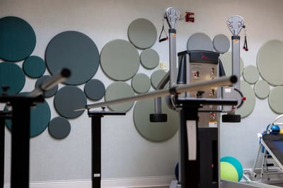 Interior view of a fitness area with equipment and decor