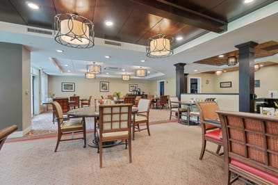 Bright dining room with tables and chairs
