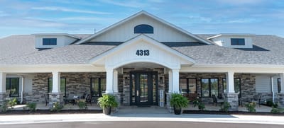 Exterior view of Northwoods Memory Care Suites building