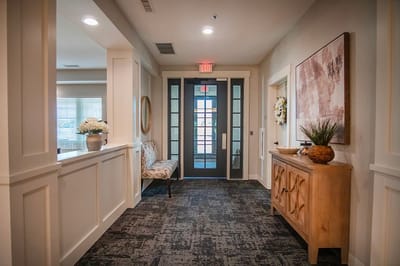 Bright and welcoming interior hallway with decor