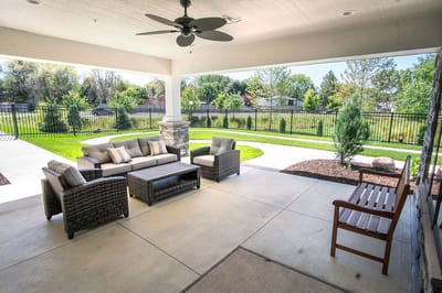 Covered outdoor seating area in a landscaped garden
