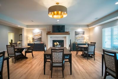 Bright dining area with tables and chairs