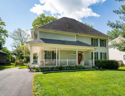 Exterior view of Vienna Manor Assisted Living with garden