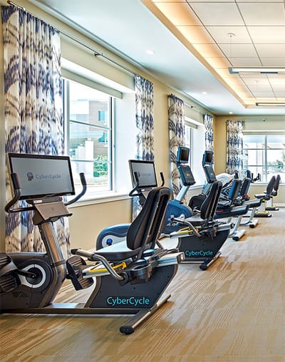 CyberCycle gym equipment in an activity room