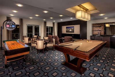 Game room with pool table and seating area