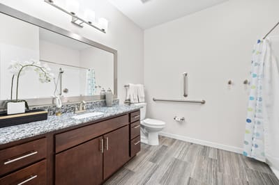 Modern restroom with stylish fixtures and decor