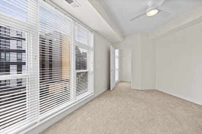 Bright interior view of a residential room with windows