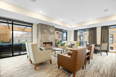 Cozy common area with seating and fireplace