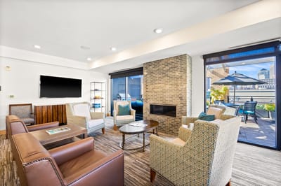 Common area with comfortable seating and outdoor access