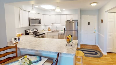 Bright kitchen area with modern appliances