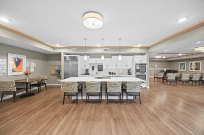 Bright common area with kitchen and seating