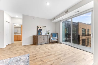 Bright interior of a private resident room with furniture