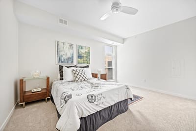 Cozy resident room with a bed and artwork
