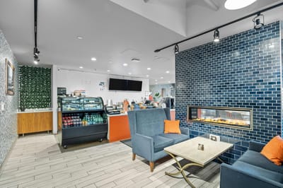 Interior view of a cozy café space with seating