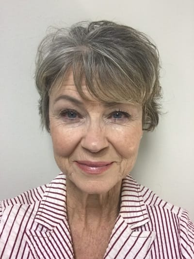 Smiling older woman with short hair