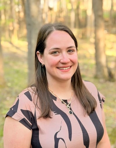 Smiling woman in a natural outdoor setting