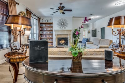Cozy common area with a fireplace and seating